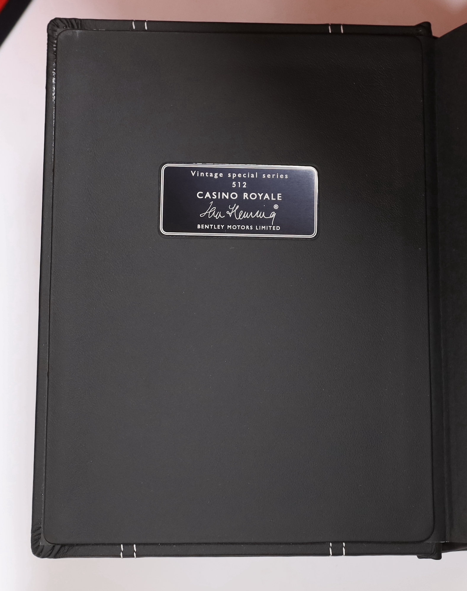 Fleming, Ian - Casino Royale, Vintage Special Series 512, by Bentley Motors Ltd., the black leather binding blind stamped with the Bentley logo, Vintage Books, London 2013, the clam shell case incorporating two sets of b